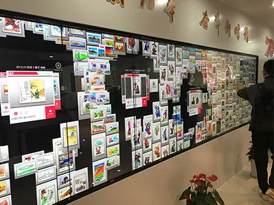 百变互动企业展厅案例_光谷未来城魔墙现场图